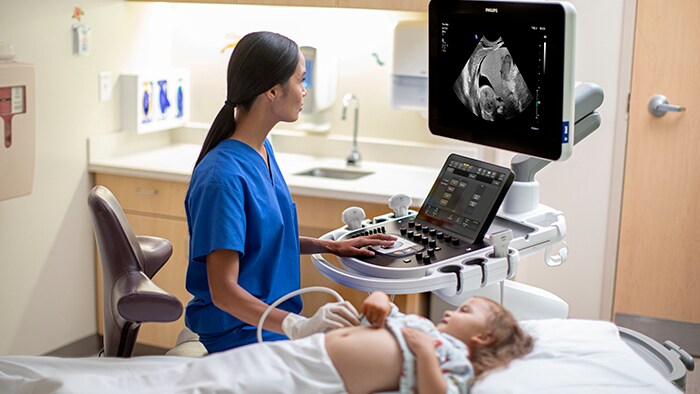 People looking at a large clinical image