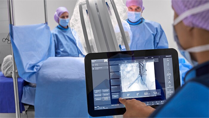 People looking at a large clinical image