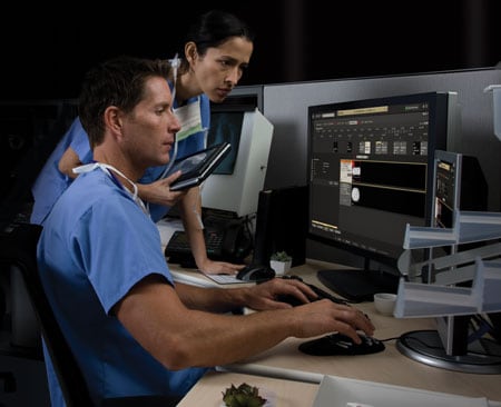 man looking at a screen