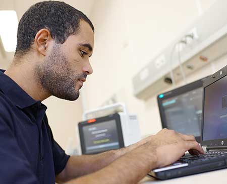 man looking at a screen