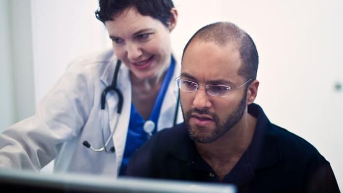 FSE and clinician in control room